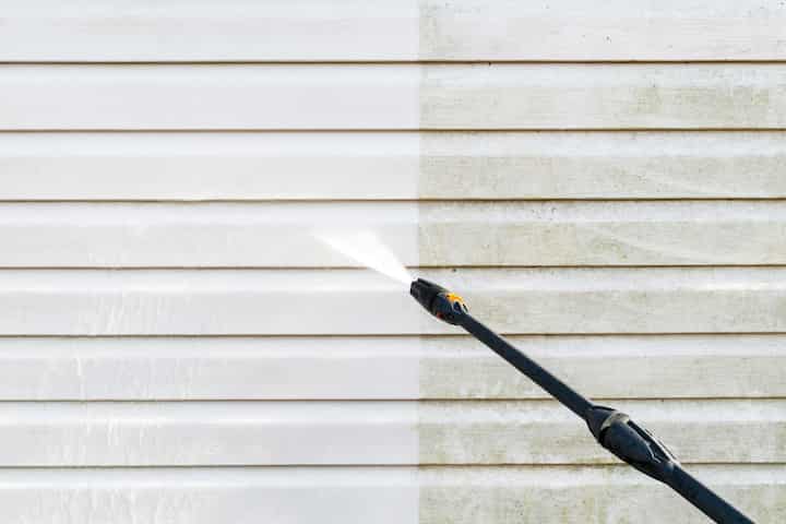 Residential exterior power washing in Grand Prairie, TX: Before and after transformation.